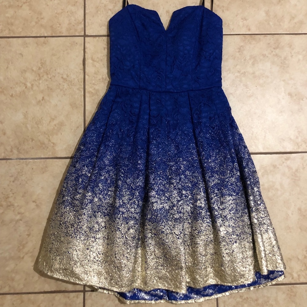 B. Darlin strapless royal blue and gold dress